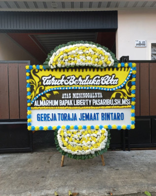 Papan Bunga Duka di Muarareja